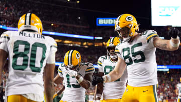 January 20, 2024; Santa Clara, CA, USA; Green Bay Packers wide receiver Dontayvion Wicks (13) and teammates celebrate in a playoff game against San Francisco. 