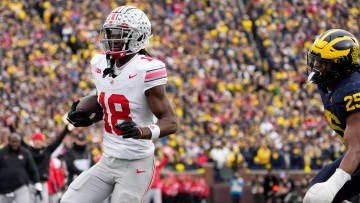 Nov. 25, 2023; Ann Arbor, Mi., USA;Ohio State Buckeyes wide receiver Marvin Harrison Jr. (18) makes a play against the Michigan Wolverines. 