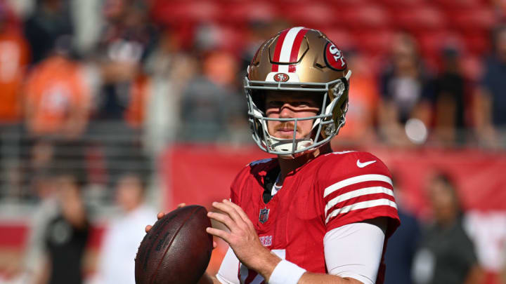 Sam Darnold, pictured holding the football, was a fantasy football force for a few weeks in 2021. 