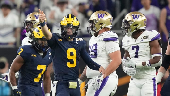 Michigan quarterback J.J. McCarthy points down the field during the second half of the College Football National Championship Game.