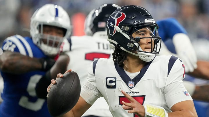 Houston Texans quarterback C.J. Stroud (7) draws back to pass Saturday, Jan. 6, 2024, during a game against the Colts. 