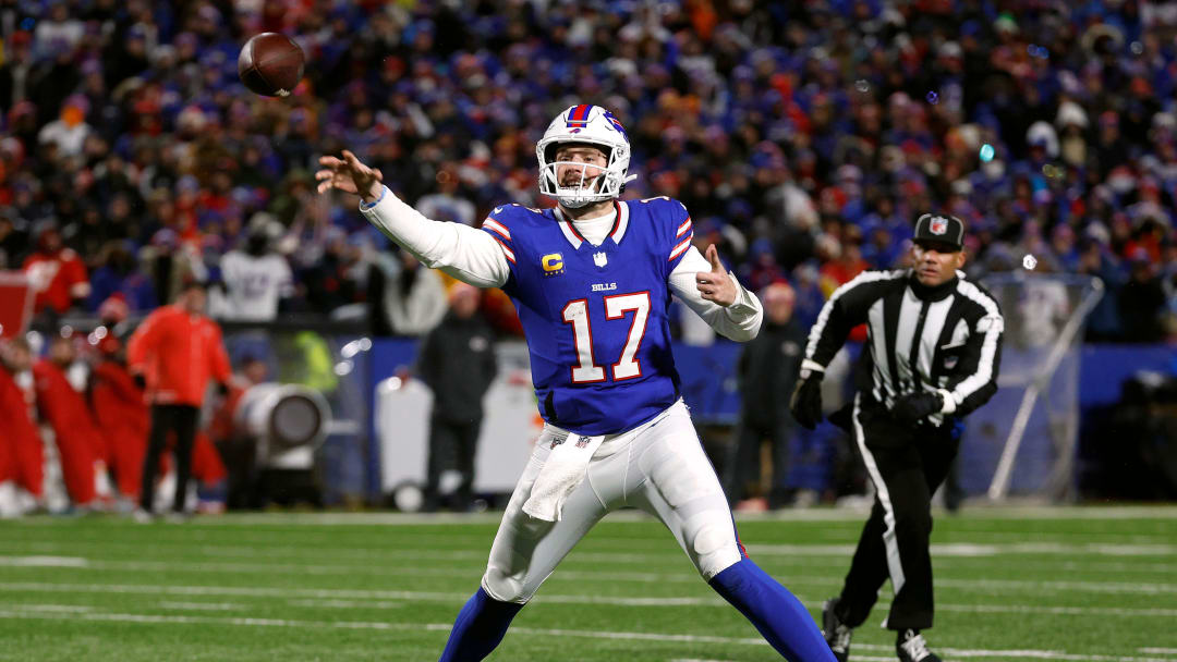 Buffalo Bills quarterback Josh Allen (17) makes an off balance for a 13-yard touchdown to Buffalo Bills wide receiver Khalil Shakir (10).