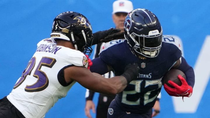 Oct 15, 2023; London, United Kingdom; Tennessee Titans running back Derrick Henry (22) carries the ball against the Baltimore Ravens. 